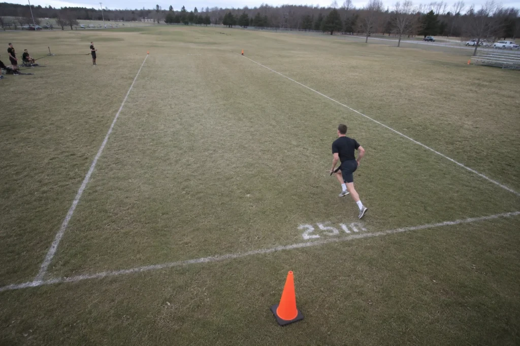 Marked 25-meter lane with turnaround cones used for the five-shuttle event.